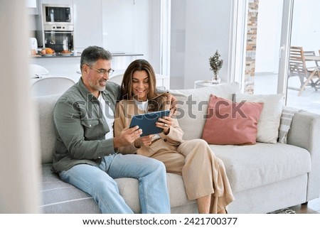 Similar – Image, Stock Photo Mature man reading book at home