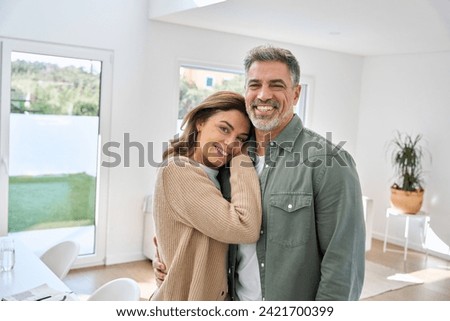 Similar – Image, Stock Photo Happy mature couple hugging in park