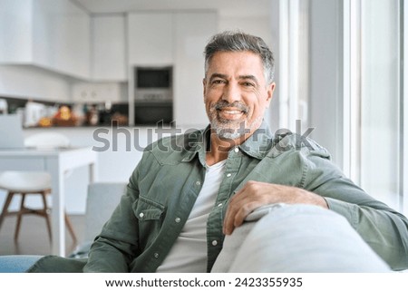 Similar – Image, Stock Photo Relaxed man chilling in swimming pool in resort