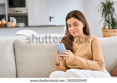 Similar – Image, Stock Photo Senior woman using mobile phone at home