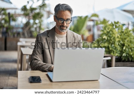 Similar – Image, Stock Photo Hispanic man looking at camera