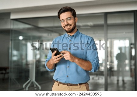 Similar – Image, Stock Photo Stylish businessman on cellphone in office