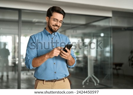 Similar – Image, Stock Photo man using mobile smart phone and computer laptop searching internet, sending sms, using text messenger or online banking.