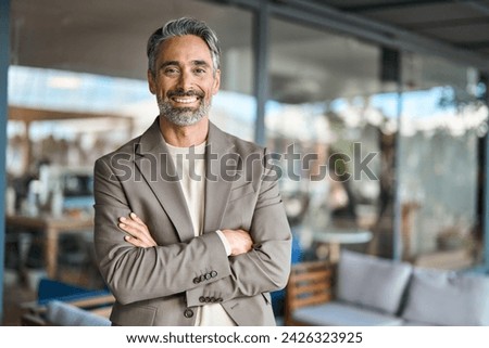 Similar – Image, Stock Photo Older man in a suit raises a finger smiling