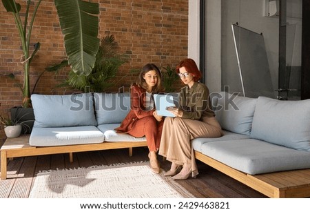 Similar – Image, Stock Photo Young Woman Talking on Phone and Holding Coffee Cup