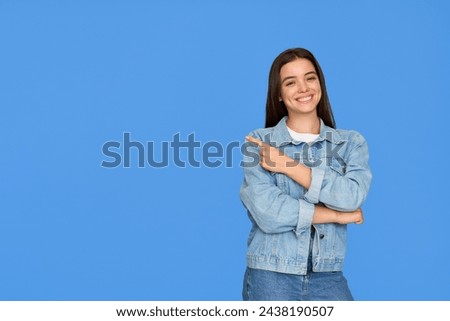 Similar – Image, Stock Photo Blue haired Teenage girl in light blue oversize hoodie staying near graffiti wall with coffee to go