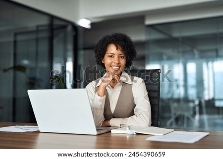 Similar – Image, Stock Photo Positive ethnic lady in headphones with opened book in library