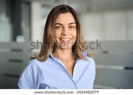 Similar – Image, Stock Photo Portrait of a 45 year old caucasian man looking to the camera, with a moustache, wearing specs and casual clothes, isolated on blue background