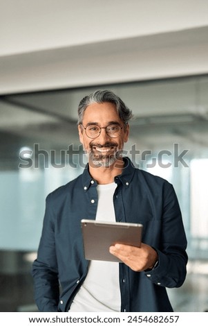 Similar – Image, Stock Photo Portrait of a man lying on a tree trunk with moss in the forest and looking sad, melancholic, serious, vulnerable into the camera