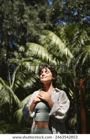 Similar – Image, Stock Photo Peaceful woman meditating in Lotus pose