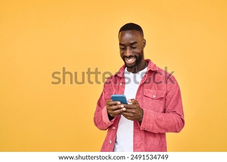 Similar – Image, Stock Photo Black man using smartphone on street