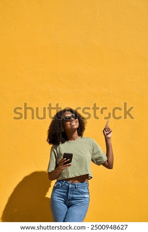 Similar – Image, Stock Photo Glad African American female listened to music from laptop