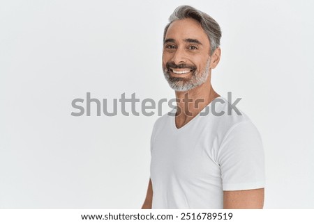 Similar – Image, Stock Photo An older man with a beard looks to the side tensely.