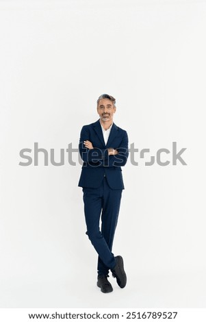 Similar – Image, Stock Photo Portrait of a 45 year old caucasian man looking to the camera, with a moustache, wearing specs and casual clothes, isolated on blue background