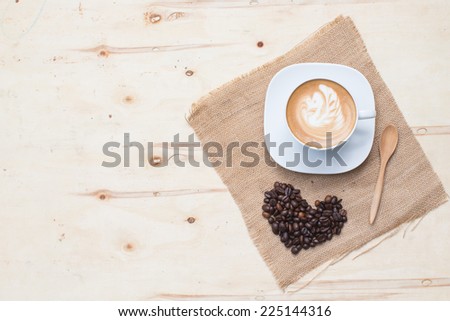 Swan drawing on latte art coffee cup