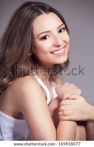 Portrait of a sensual woman. Natural beauty of a young woman in the studio.