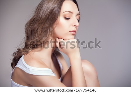 Portrait of a sensual woman. Natural beauty of a young woman in the studio.