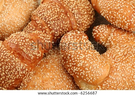 Fresh sweet rolls with sesame, background