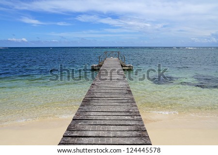 Wooden dock at beach with sea horizon, Panama, Zapatillas island marine park, Central America
