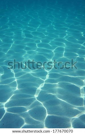 Underwater sunlight on the sand of ocean floor, Atlantic ocean