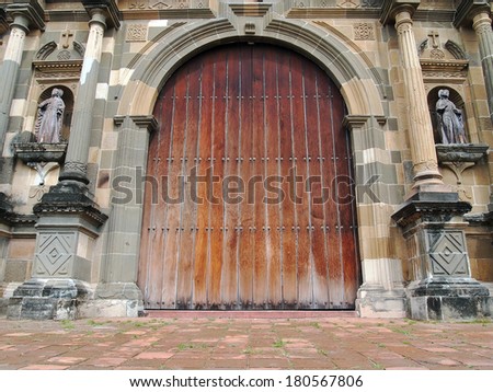 Old massive door of the Metropolitan Cathedral in Casco Viejo, Panama City, Panama
