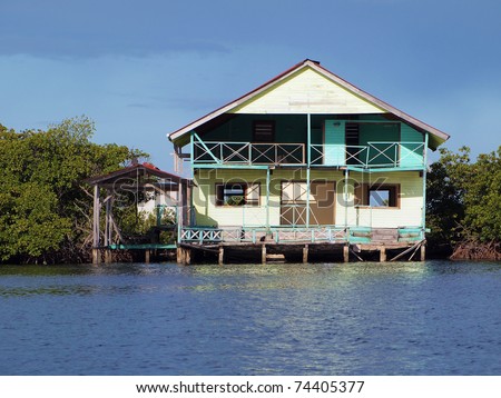 Abandoned tropical house over the water, Caribbean sea, Bocas del Toro, Panama