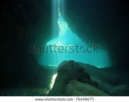 Underwater cave with light beams from a crevasse, natural scene, Mediterranean sea, Vermilion coast, Pyrenees Orientales, Roussillon, France