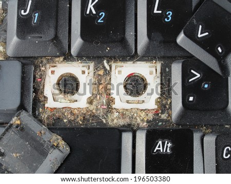 Dirty computer keyboard with keys removed for cleaning