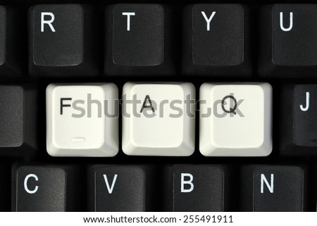 FAQ for Frequently Asked Questions as key caps on computer keyboard