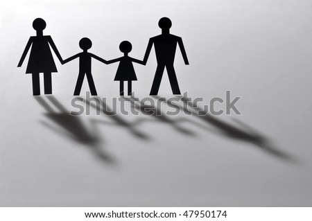 Mother, father and two children with shadows