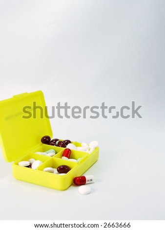 open carrying case loaded with medicine