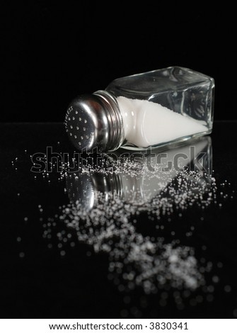 spilling salt of a shaker