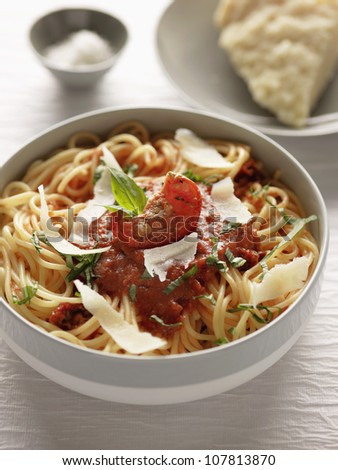 Spaghettis with sun-dried tomato puree,basil and parmesan