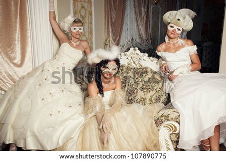 Group of beautiful women in masks