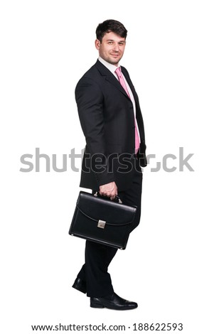 Full body portrait of young happy smiling cheerful business man, over white background