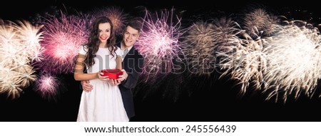 Beautiful couple with a gift box. Valentine\'s day