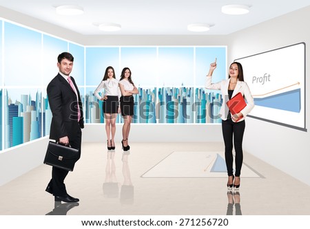 Group of business consultants standing at office