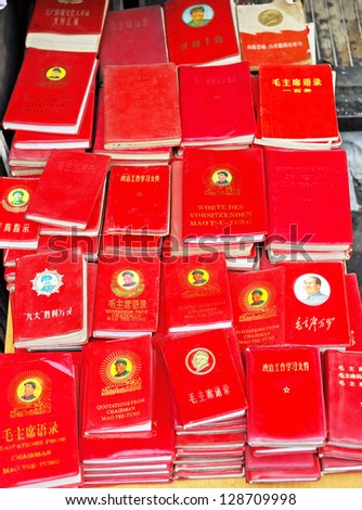 SHANGHAI, CHINA-MAY 4: Dongtai Lu Antique Market Mao red books on sales. During Mao rule almost every person in china had a red book. May 4, 2007 Shanghai, China
