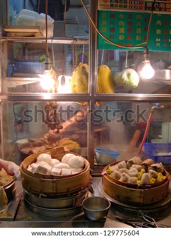 HONG KONG-Â?Â?NOVEMBER 20: Typical street restaurant.  With more than 12000 street stalls Hong Kong is one of the most vibrant food capitals in the world. November 20, 2005 in Hong Kong, China