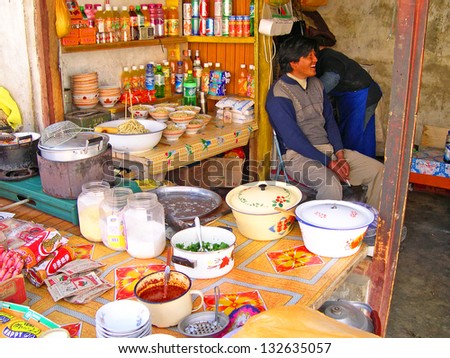 LHASA, TIBET-NOVEMBER 12: typical street restaurant in Drepung temple area. Over 1 million visitors come to Lhasa each year. November 12, 2004 in Lhasa, Tibet