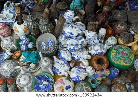 SHANGHAI, CHINA-MAY 4: Dongtai Lu Antique Market tea cups on sale. The market is great for mementos and souvenirs of Shanghai. May 4, 2007 Shanghai, China