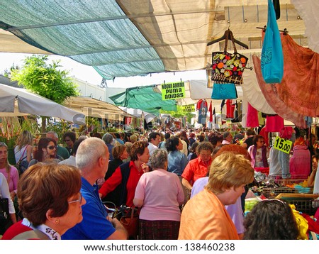 RAVENNA, ITALY MAY 21: locals and tourists at the Wednesday outdoor market. The place is very popular in the city and attracts thousands of people. May 21, 2005 Ravenna Italy