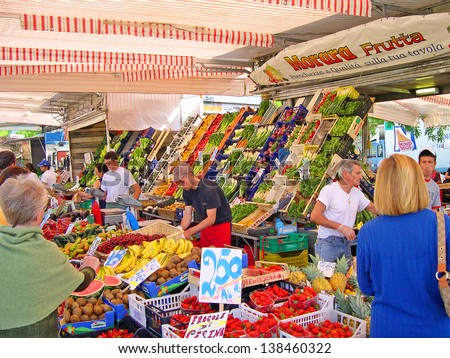 RAVENNA, ITALY MAY 21: fruits and vegetables vendor at the Wednesday outdoor market. The place is very popular in the city and attracts thousands of people. May 21, 2005 Ravenna Italy
