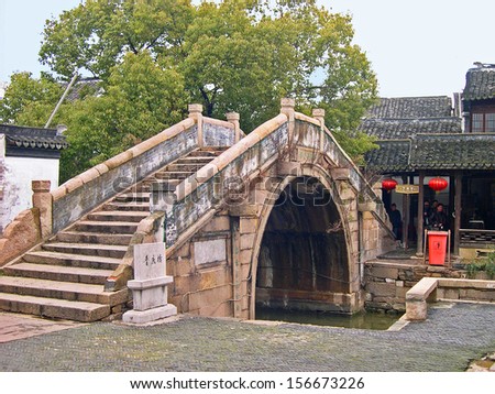 JINXI, SHANGHAI, CHINA Ã¢Â?Â? FEBRUARY 6: old bridge over the village waterway. The ancient village is a Shanghai tourist attraction with 100000 visitors per year. February 6, 2005, Jinxi, China