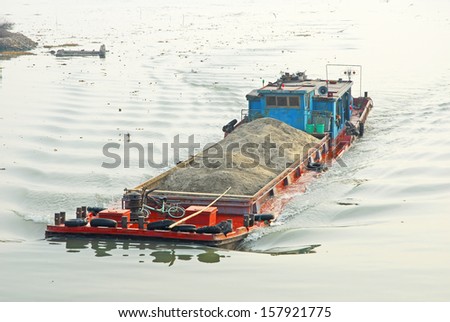 JINXI, SHANGHAI, CHINA  JANUARY 9: big barges are the village main transportation system. The village is a Shanghai tourist attraction with 100000 visitors per year. January 9, 2010, Jinxi, China