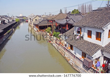 FENGJING, SHANGHAI, CHINA -Â?Â? MARCH 17:  village main waterway. The ancient village is a Shanghai tourist attraction with 100000 visitors per year. March 17, 2010, Fengjing, China.