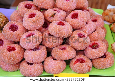 Red pastries with a drop of marmalade.