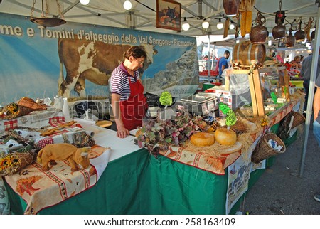 CERVIA, ITALY-SEPTEMBER 21, 2014: Piedmont cheese  stand at the annual International food outdoor market. This market is very popular and attract thousands of tourists.