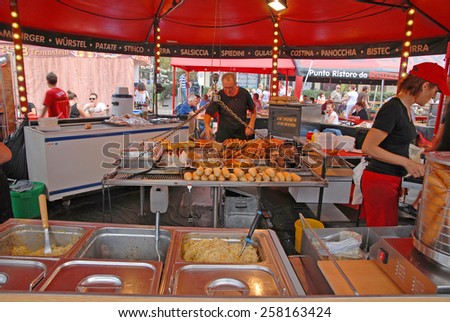 CERVIA, ITALY-SEPTEMBER 21, 2014: hamburger and sandwich stand at the annual International food outdoor market. This market is very popular and attract thousands of tourists.