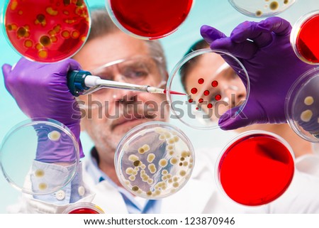 Similar – Image, Stock Photo man pipetting in the laboratory